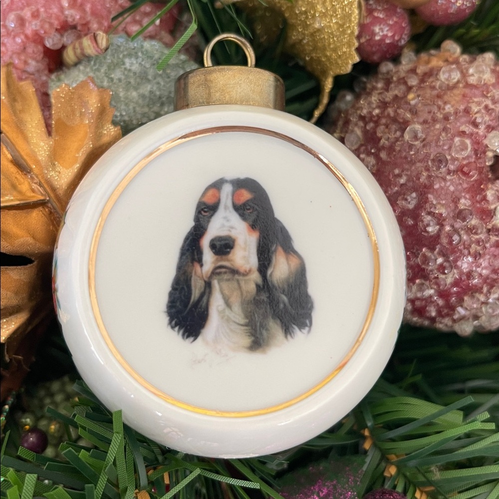 Porcelain Christmas ornament with Cocker Spaniel by artist Robert J May